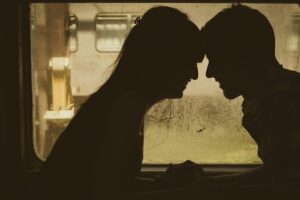 A couple sitting together and talking